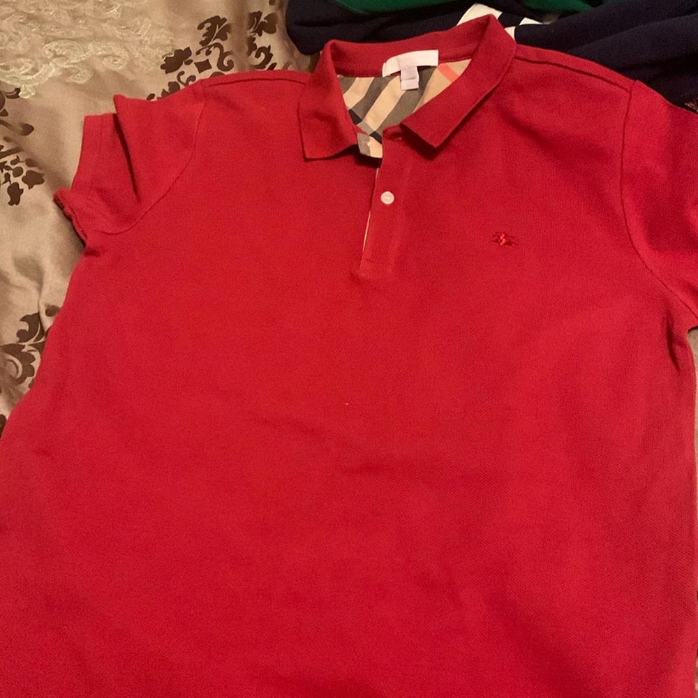 Boys Burberry polo.  Used little stain on bottom